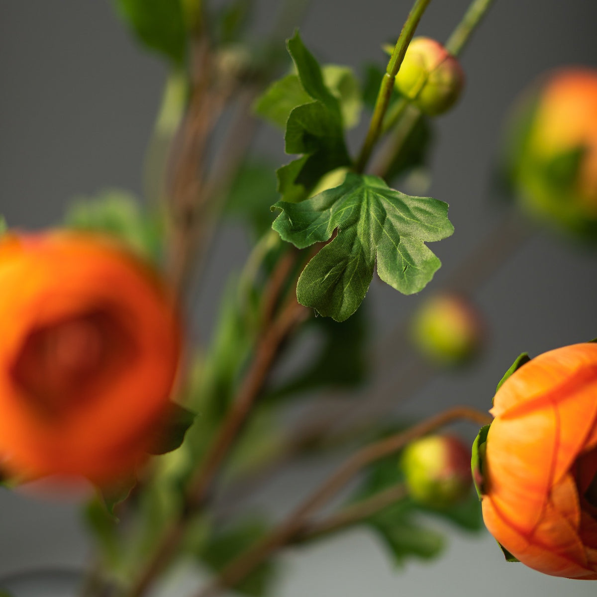 Faux Orange Ranunculus arrangement